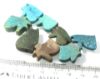 Picture of   Ancient Egypt. LOT OF 8 FAIENCE EYE OF HORUS  AMULETS. 600 - 300 B.C