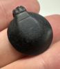 Picture of  ANCIENT EGYPT.  A BLACK STONE PENDANT (HEART AMULET?).  600 - 300 B.C    