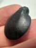 Picture of  ANCIENT EGYPT.  A BLACK STONE PENDANT (HEART AMULET?).  600 - 300 B.C    