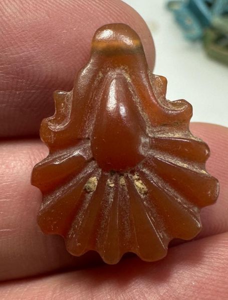 Picture of   Ancient Egypt.  GRECO - ROMAN PERIOD. 300 B.C - 100  A.D.  CARNELIAN STONE LOTUS FLOWER AMULET