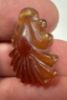Picture of   Ancient Egypt.  GRECO - ROMAN PERIOD. 300 B.C - 100  A.D.  CARNELIAN STONE LOTUS FLOWER AMULET