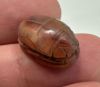 Picture of   Ancient Egypt.  LATE PERIOD. 600 - 100 B.C.  CARNELIAN STONE SCARAB