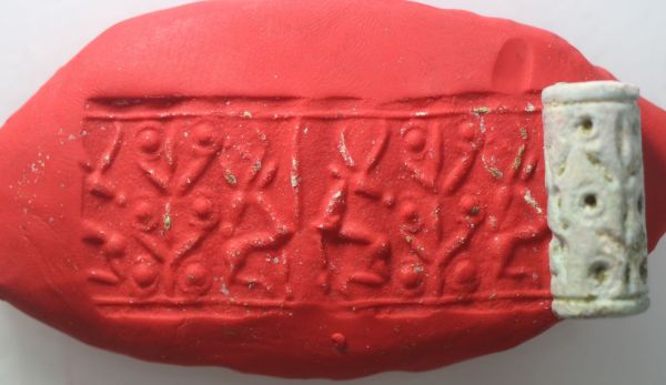 Picture of   Ancient Egypt.   SECOND INTERMEDIATE PERIOD. FAIENCE CYLINDER SEAL. 1780 - 1550 B.C