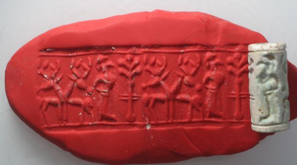 Picture of   Ancient Egypt.   SECOND INTERMEDIATE PERIOD. FAIENCE CYLINDER SEAL. 1780 - 1550 B.C