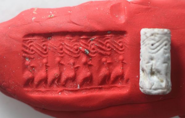 Picture of  Ancient Egypt.   SECOND INTERMEDIATE PERIOD. FAIENCE CYLINDER SEAL. 1780 - 1550 B.C