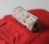 Picture of  Ancient Egypt.   SECOND INTERMEDIATE PERIOD. FAIENCE CYLINDER SEAL. 1780 - 1550 B.C