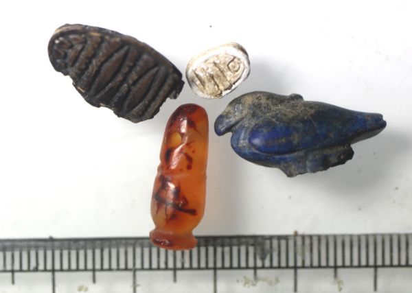Picture of   Ancient Egypt.   LOT OF 4 STONE SCARABS AND AMULETS. NEW KINGDOM 1400 - 1200 B.C