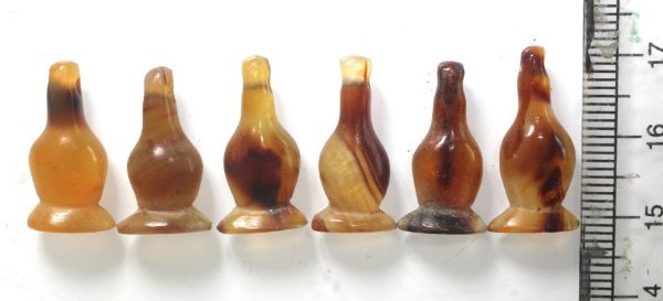 Picture of   Ancient Egypt. LOT OF 6 CARNELIAN STONE POPPY SEED AMULETS. 600 - 300 B.C