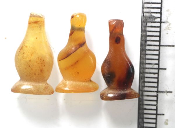 Picture of   Ancient Egypt. LOT OF 3 CARNELIAN STONE POPPY SEED AMULETS. 600 - 300 B.C
