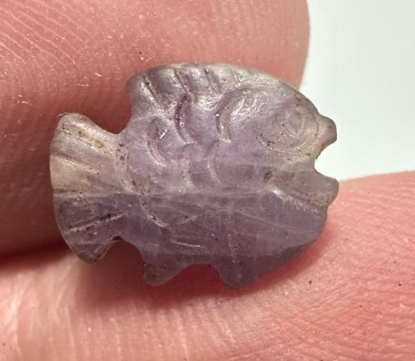 Picture of   Ancient Egypt. Beautiful Amethyst Stone fish Amulet. late period. 600 - 300 B.C