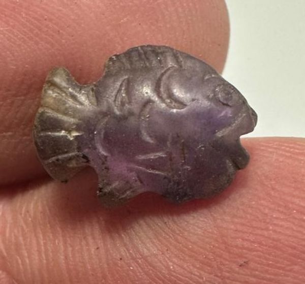 Picture of   Ancient Egypt. Beautiful Amethyst Stone fish Amulet. late period. 600 - 300 B.C