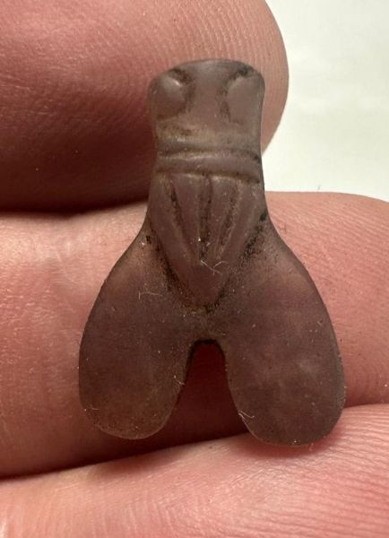 Picture of  ANCIENT EGYPT . AMETHYST STONE FLY  AMULET. 1400 - 1200 B.C  NEW KINGDOM